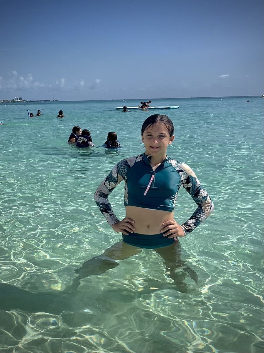 Ruby standing in clear turquoise sea water